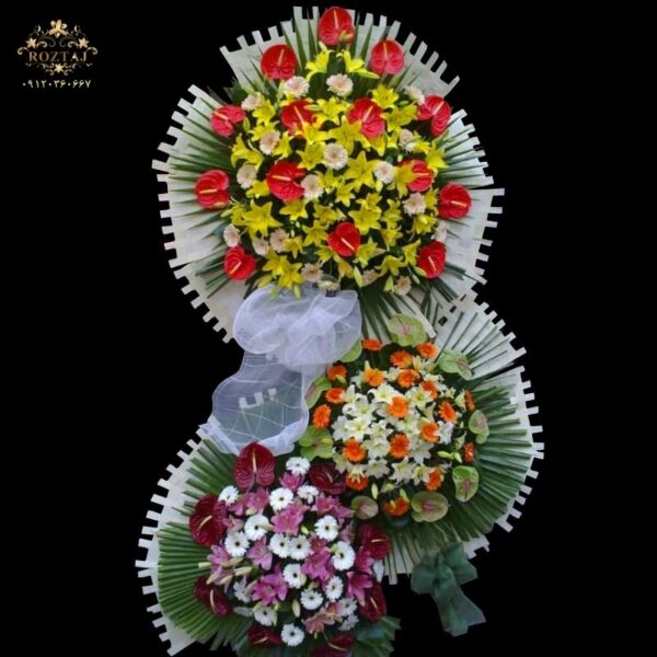 تاج گل برای عرض تبریک 3 طبقه با گلهای آنتریوم لیلیوم ژربرا